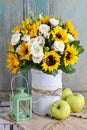 Bouquet of white roses and sunflowers Royalty Free Stock Photo