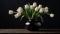 Bouquet of white tulips in black vase on dark background