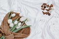 Bouquet of white tulips with sweater for womens day, coffee cup Royalty Free Stock Photo