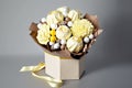 bouquet of white yellow flowers for birthday congratulations and candy like confectionary