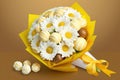 bouquet of white yellow flowers for birthday congratulations and candy like confectionary