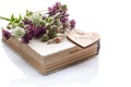 Bouquet Of Wild Flowers On Old Book On A White Background. Isolated Vintage Composition