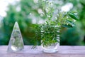 bouquet of wild flowers on old wooden table in garden, mirror shard, beautiful blurred natural landscape in background with green Royalty Free Stock Photo