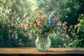 Bouquet of wild flowers on the table in a glass vase. Selective focus. Royalty Free Stock Photo
