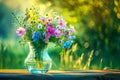 Bouquet of wild flowers on the table in a glass vase. Selective focus. Royalty Free Stock Photo