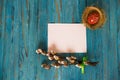 Bouquet willow branch and Easter eggs on a wooden table