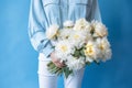 bouquet woman mother yellow hand floral flower sweater white blue romantic. Generative AI. Royalty Free Stock Photo