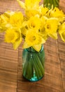 Bouquet of yellow daffodil flowers in a jar Royalty Free Stock Photo