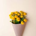 Bouquet of yellow flowers and blank on pastel background, beautiful breakfast, vintage romantic card, top view, flat lay. Royalty Free Stock Photo