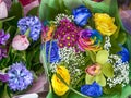 Bouquet of yellow fresia, hyacinth and colorful rose