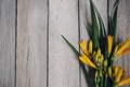 bouquet of yellow lilies on a wooden background, wedding bouquet