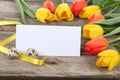 Bouquet of yellow and red tulips and easter eggs Royalty Free Stock Photo
