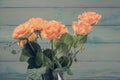 Bouquet of yellow roses in glass vase Royalty Free Stock Photo