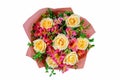 Bouquet of yellow roses and pink alstroemeria wrapped in red paper cone isolated on white background Royalty Free Stock Photo