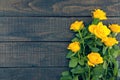 Bouquet of yellow roses on rustic wooden background. Valentine's Royalty Free Stock Photo