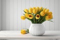 Bouquet of yellow tulips in a vase on a white wooden table, floral background. Festive frame, gift card with copy space, floral Royalty Free Stock Photo