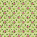 Bouquets of bright roses, leaves and spots on a green background, seamless pattern Royalty Free Stock Photo