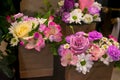 Bouquets with delicate roses, chrysanthemum, alstroemeria and daisy flowers in a floral shop.