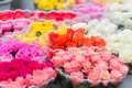 Bouquets of different varieties of roses at a street market. Selling colorful flowers