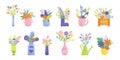 Bouquets of flowers, florist compositions of tulips, orchids, lilies, roses in floral vases, boxes and watering can