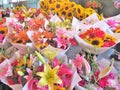 Bouquets of fresh cut flowers at an outdoor market Royalty Free Stock Photo