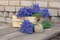 Bouquets of lavender in wooden box and a coil of rope Royalty Free Stock Photo