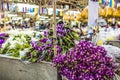 Bouquets of purple and white orchid flowers stacked on display a Royalty Free Stock Photo