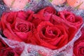 A bouqute of red roses with droplet in pastice wrap Royalty Free Stock Photo