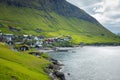 Bour village. Typical grass-roof houses and green mountains. Vagar island, Faroe Islands. Denmark. Europe