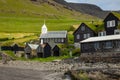 Bour village. Typical grass-roof houses and green mountains. Vagar island, Faroe Islands. Denmark. Europe