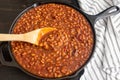 Bourbon Baked Beans in a Cast Iron Skillet Royalty Free Stock Photo