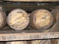 Bourbon barrels on racks in a rickhouse Royalty Free Stock Photo