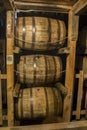 Bourbon barrels in warehouse Royalty Free Stock Photo