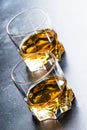 Bourbon in glass, american corn whiskey, dark bar counter, selective focus