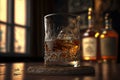Bourbon or whisky glass on dark woody background, close up