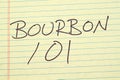 Bourbon 101 On A Yellow Legal Pad Royalty Free Stock Photo