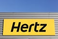 Hertz logo on a wall