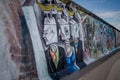 Germany; Berlin, Street Art, East Side Gallery; Bourgeois meal