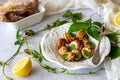 Bourguignonne snail with lemon. Marble background. French cuisine Royalty Free Stock Photo