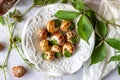 Bourguignonne snail with lemon. Marble background. French cuisine Royalty Free Stock Photo