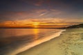 Bournemouth beach illuminated by the setting sun at sunset Royalty Free Stock Photo