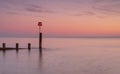Bournemouth beach illuminated by the setting sun at sunset Royalty Free Stock Photo