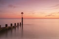 Bournemouth beach illuminated by the setting sun at sunset Royalty Free Stock Photo