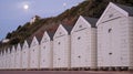 White colour beach huts located on the promenade facing the sea on the Bournemouth UK sea front. Royalty Free Stock Photo