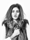 Boutique selling luxury fur. Winter fashionable wardrobe. Silver fur vest fashion clothing. Luxury fur accessory. Girl