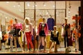 Boutique window,Fashion clothing store,Fashion store window in shopping mall,dress shop window taken at night Royalty Free Stock Photo