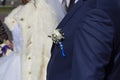 Boutonniere on groom`s wedding jacket Royalty Free Stock Photo