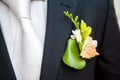 Boutonniere on the lapel of the groom