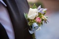 Boutonniere on the lapel of the groom