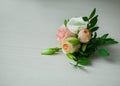 Boutonniere on white background. Wedding flowers